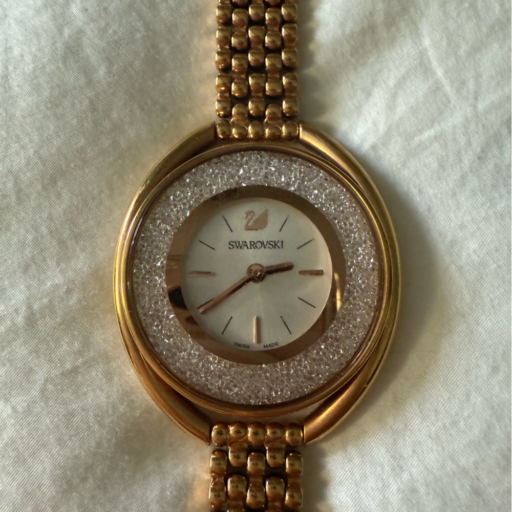 Swarovski Crystalline Aura gold watch with crystals.